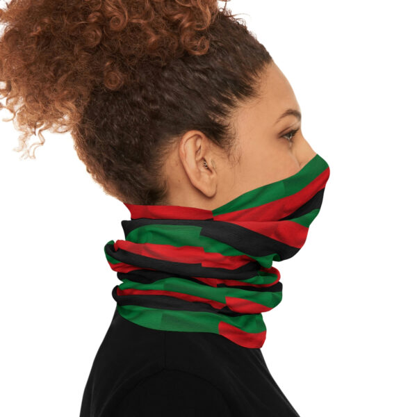 The Side View of a Man in a Flag Themed Scarf