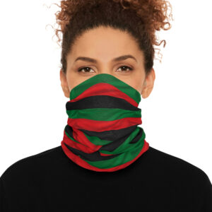 A Woman in a Green Black and Red Stripes Scarf