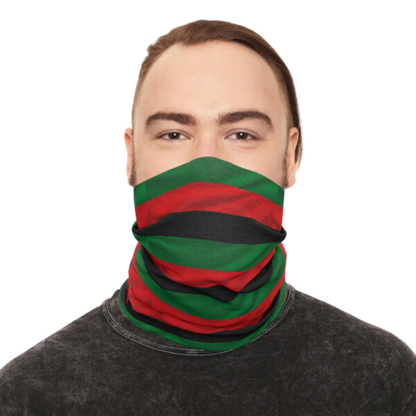 A Man in a Flag Themed Scarf Around Mouth