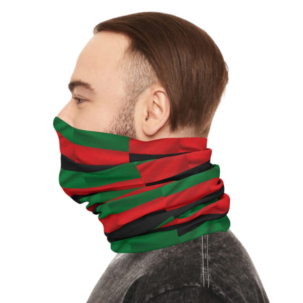 The Side Profile of a Man in a Flag Themed Scarf