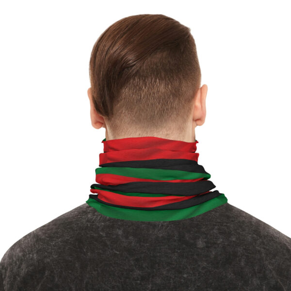 The Back of a Man in a Flag Themed Scarf