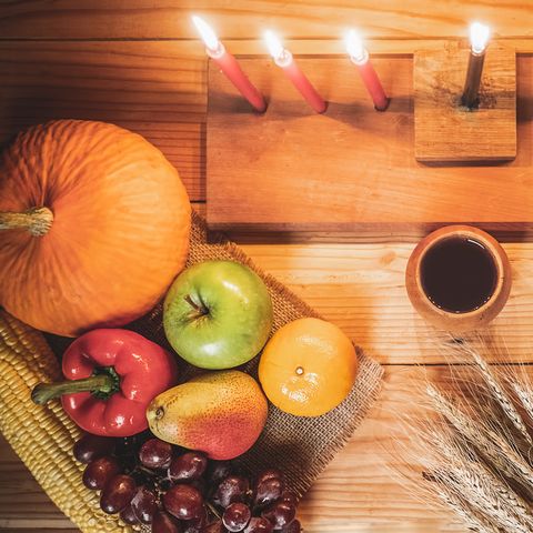 A Mazao Kwanzaa Setup With Candles