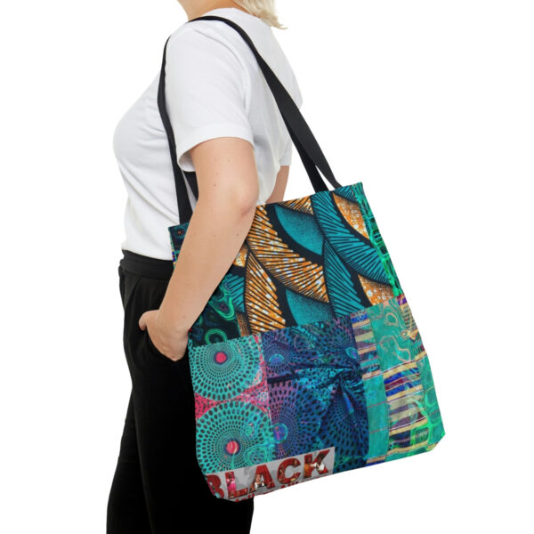 A Woman Wearing a Teal and Red Color Tote